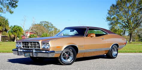 Exterior: •Solid body with good paint in original, code 4C "Ivy Glow" metallic. . Ford gran torino 1973 for sale